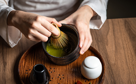 Whisking ceremonial grade matcha